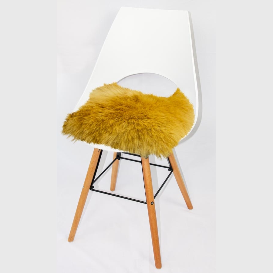 Quadratische Sitzauflagen aus austral. Lammfell - ocker